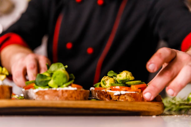 istock Professional chef serving healthy sandwiches he prepared 1384224287