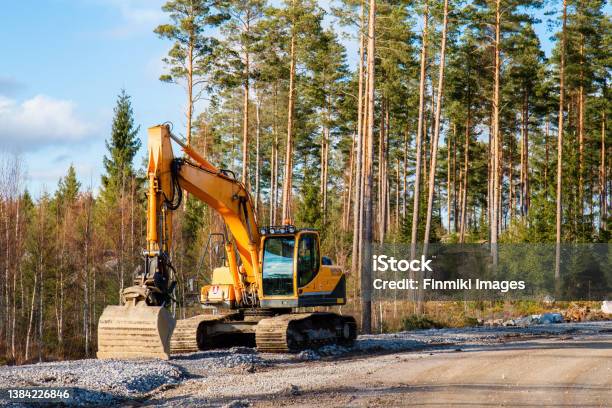 Yellow Excavator Stock Photo - Download Image Now - Backhoe, Earthwork, Vehicle Scoop