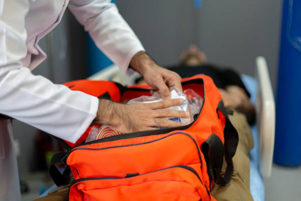 istock Trauma bag on the bed between the patient's legs 1384232576