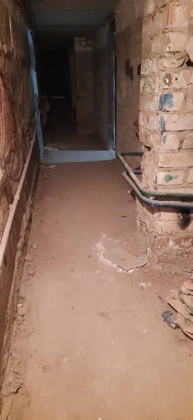 istock Empty basement in the house, like a shelter during the war. Bomb shelter. 1384232996