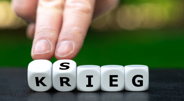 istock Hand turns dice and changes the German word 