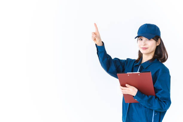 istock Woman in work clothes doing inspection 1384241307