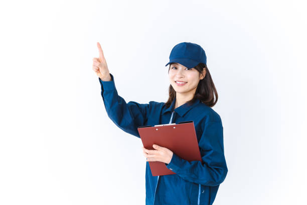 istock Woman in work clothes doing inspection 1384241308