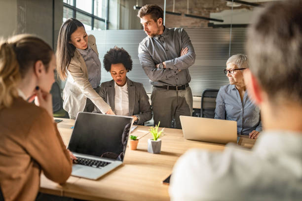 istock Multi-ethnic business team working on a meeting in the office. 1384241972