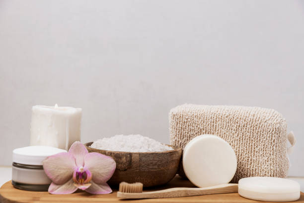istock Hotel spa treatment or home bath procedure. Bathroom with accessories on tray 1384247979