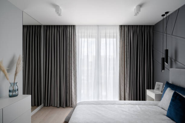 istock Modern bedroom in gray and blue colors 1384248023