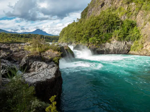 Photo of PetrohuÃ© Waterfalls downstream from the Todos los Santos Lake, Vicente Rosales National Park, Puerto Varas, Chile