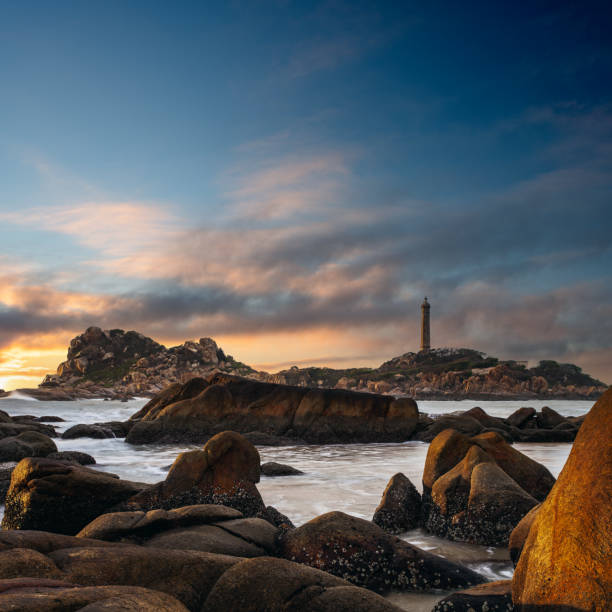 istock Dramatic sunset over the lighthouse on an island at Ke Ga coast 1384248936