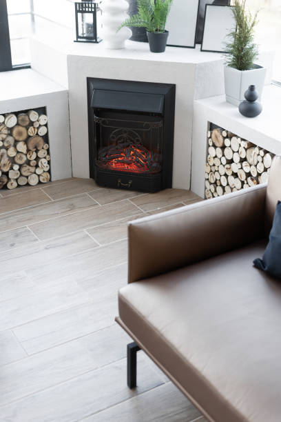istock Bright and spacious living room with fireplace 1384248990