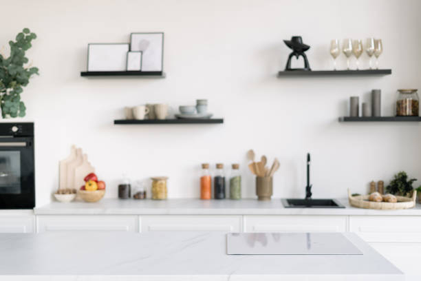 istock Large kitchen with induction cooker and decor 1384249069