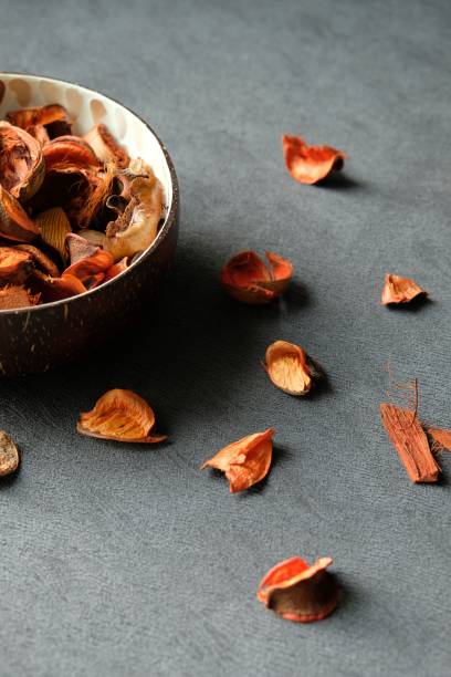 istock Orange petals in coconut bowl 1384251525