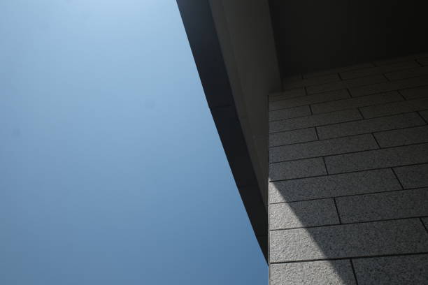istock Cooperation of blue sky stone building 1384258202