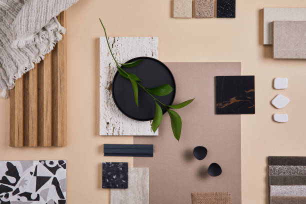 istock Creative flat lay composition of interior designer and architect moodboard. Textile and paint samples, lamella panels and lastrico tiles. Beige, black and green color palette. Copy space. Template. 1384259443