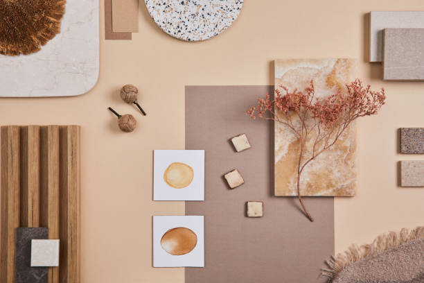 istock Flat lay of stylish architect moodboard composition with beige samples of textile, paint, wooden lamella panels and tiles. Top view. Copy space. Template. 1384259450