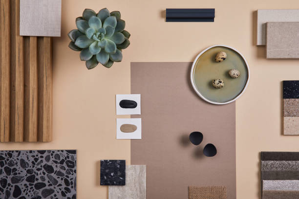 istock Creative flat lay composition of interior designer and architect moodboard. Textile and paint samples, lamella panels and lastrico tiles. Beige, black and green color palette. Copy space. Template. 1384259452