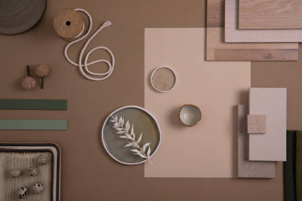 istock Creative flat lay composition of interior designer moodboard with textile and paint samples, panels and tiles. Beige, brown and green color palette. Copy space. Template. 1384259456
