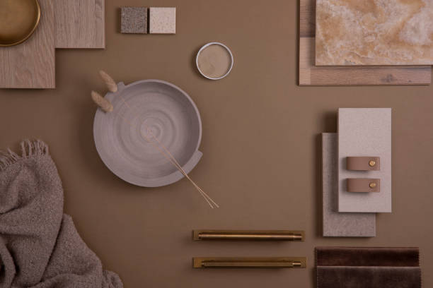 istock Creative flat lay composition of interior designer moodboard with textile and paint samples, panels and tiles. Beige, brown and grey color palette. Copy space. Template. 1384259466