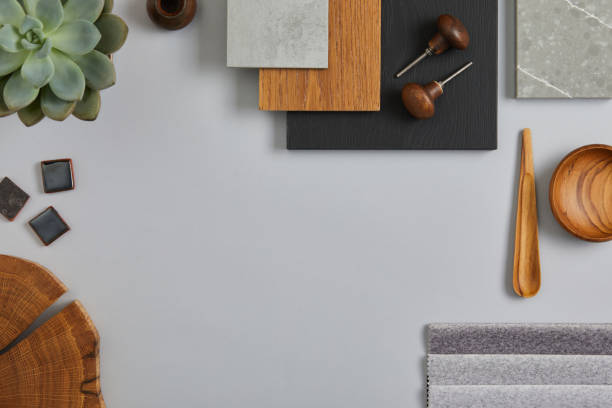istock Perfect architect moodboard. Flat lay composition in light grey, black and brown color palette with textile and paint samples, wooden panels and tiles. Top view. Copy space. Template. 1384259473