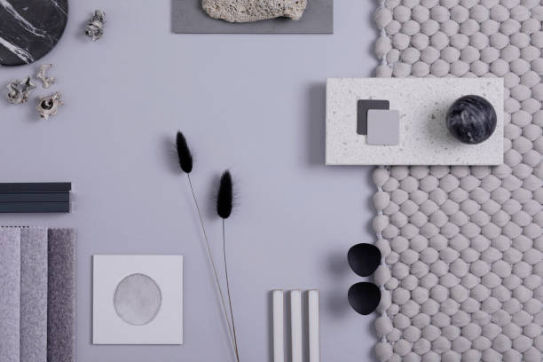 istock Stylish architect and interior designer moodboard. Flat lay composition in grey color palette with textile and paint samples, panels and tiles. Top view. Copy space. Template. 1384259564