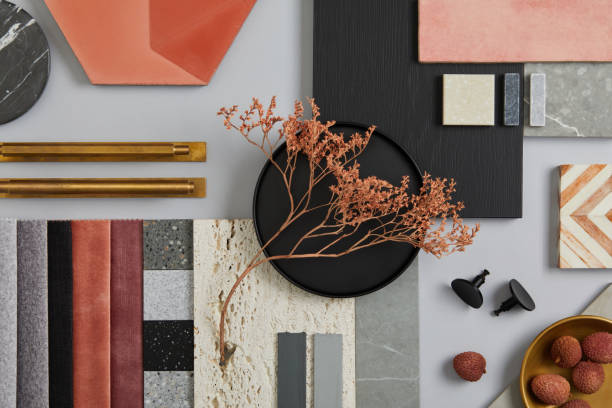 Creative flat lay composition with textile and paint samples, panels and tiles. Stylish interior designer moodboard. Pink, black and light grey color palette. Copy space. Template. stock photo