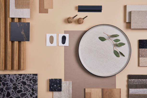 istock Creative flat lay composition of interior designer and architect moodboard. Textile and paint samples, lamella panels and lastrico tiles. Beige, black and green color palette. Copy space. Template. 1384259626