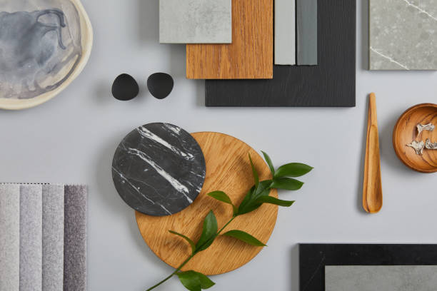 istock Elegant architect moodboard flat lay composition in light grey, black and brown color palette with textile and paint samples, wooden panels and marble tile. Top view. Copy space. Template. 1384259646