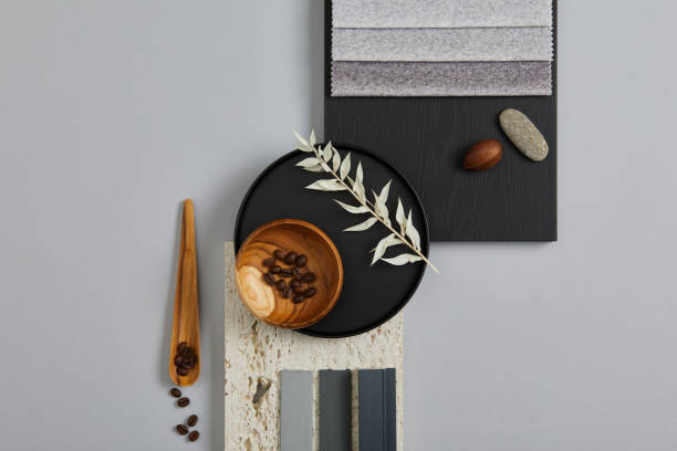 istock Perfect architect moodboard. Flat lay composition in light grey, black and brown color palette with textile and paint samples, wooden panels and tiles. Top view. Copy space. Template. 1384259675