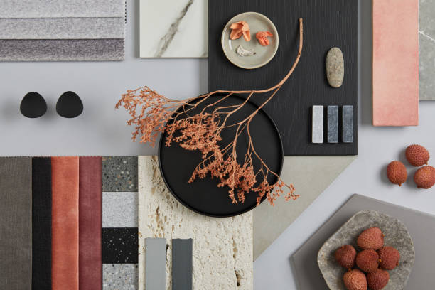 istock Creative flat lay composition with textile and paint samples, panels and tiles. Stylish interior designer moodboard. Pink, black and light grey color palette. Copy space. Template. 1384259676