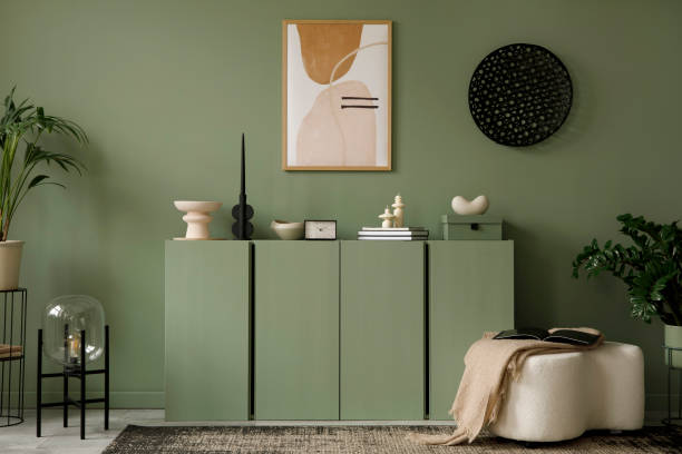 istock Modern living room interior composition with mockup poster frame, eucalyptus wooden commode, plants and modern home accessories. Eucalyptus wall. Home staging. Template. Copy space. 1384261754