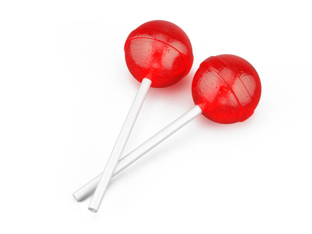 istock Pair of Red sweet lollipops - round candy on white stick isolated on white. 3d rendering 1384261808