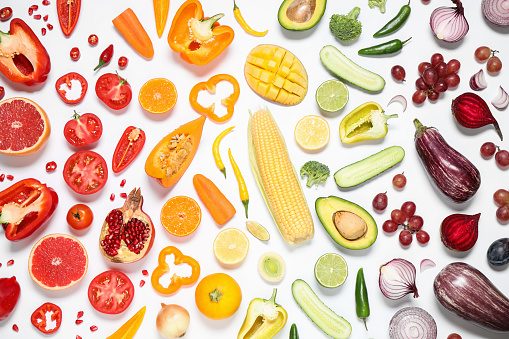 Composition with fresh organic fruits and vegetables on white background, top view