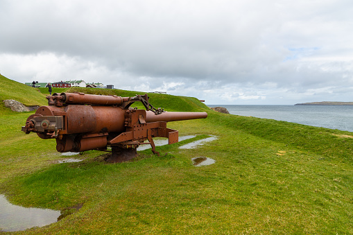 Thorshavn, Faroe Islands, Denmark - 03 May 2018: A cannon, a war exhibit in the Skansin fort in Thorshavn.