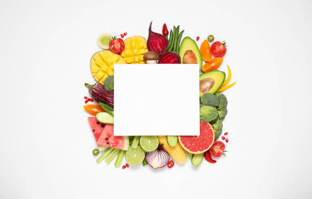istock Composition with organic fresh vegetables, fruits and blank card on white background, top view. Space for text 1384263320