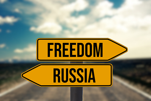 Two arrows point to Russia and freedom