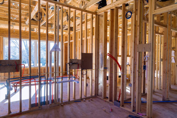 istock Installed of hot red and cold blue pex pipe layout PVC waste water system in kitchen 1384264481