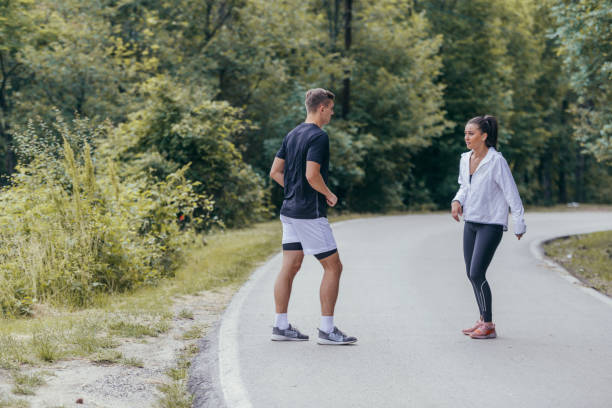 istock Young female defending herself from an attacker with karate moves. 1384265442