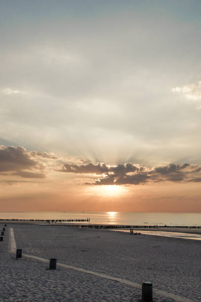 istock Sea sunrise in the north sea, Netherlands 1384267113
