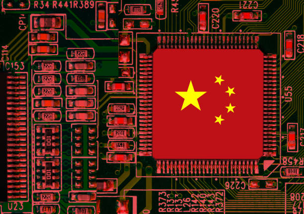 istock Chinese National Flag overlaid on PC micro chip on integrated circuit 1384267804