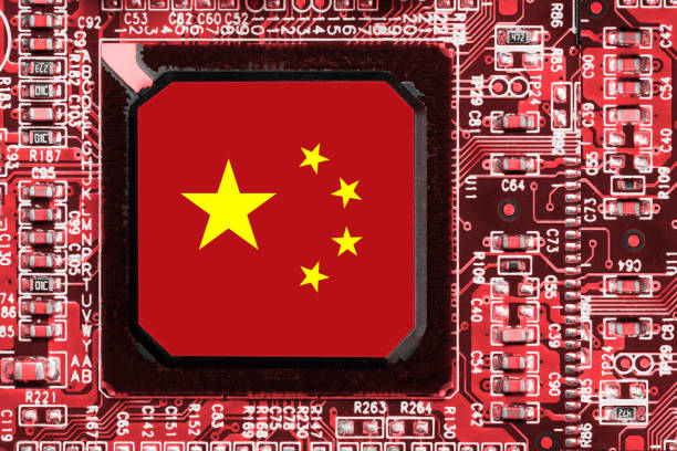 istock Chinese National Flag overlaid on PC micro chip on integrated circuit 1384268004