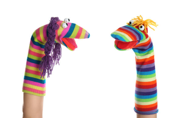 istock Funny sock puppets for show on hands against white background 1384269370