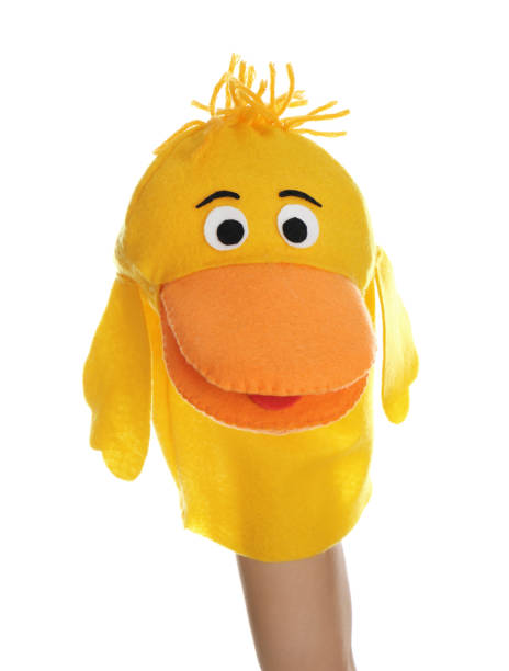istock Duck puppet for show on hand against white background 1384269373