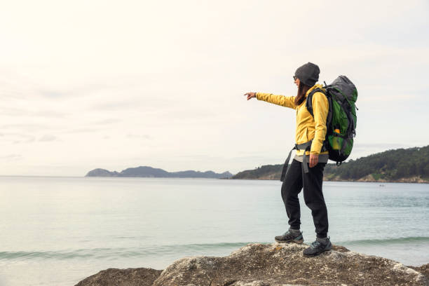 istock Woman pointing to the view 1384276004