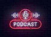 istock Podcast neon sign, bright signboard, light banner. Podcast logo neon, emblem and label. Vector illustration 1384283339