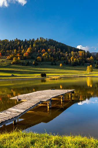 autumn pond under the mountains, Murau district, Styria, Austria