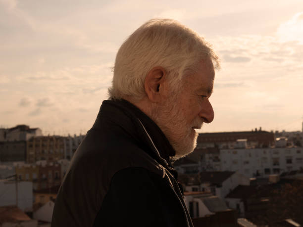 istock Profile view of pensive senior man 1384285811