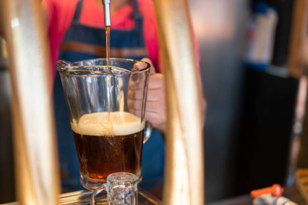 istock man who works in small drink business serves beers 1384285997