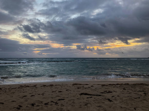 istock Storm clouds over ocean during sunrise in St Kitts 1384294802