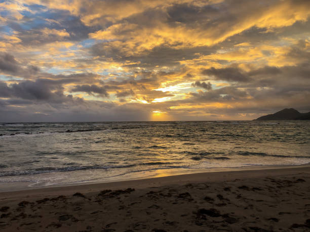 istock Storm clouds over ocean during sunrise in St Kitts 1384294807