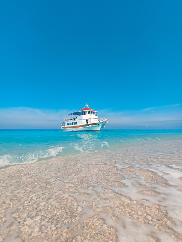 cruise boat at egremni beach greece vacation lefkada island