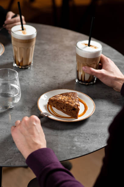 istock Coffee and cake on the table in a cafe 1384303287